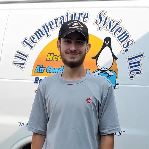 Man in front of service van