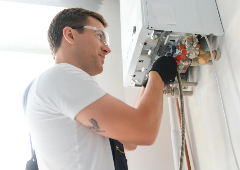 Man repairing home heating system