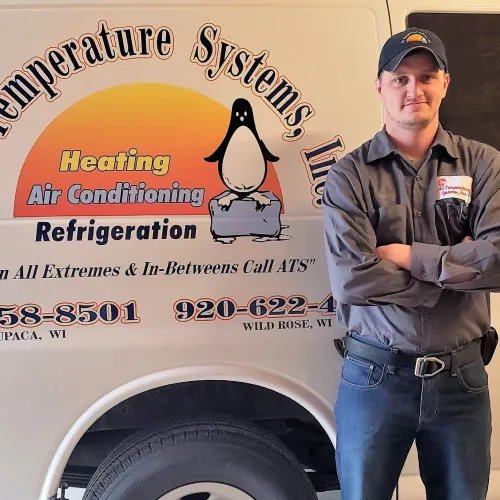 Man standing by service van