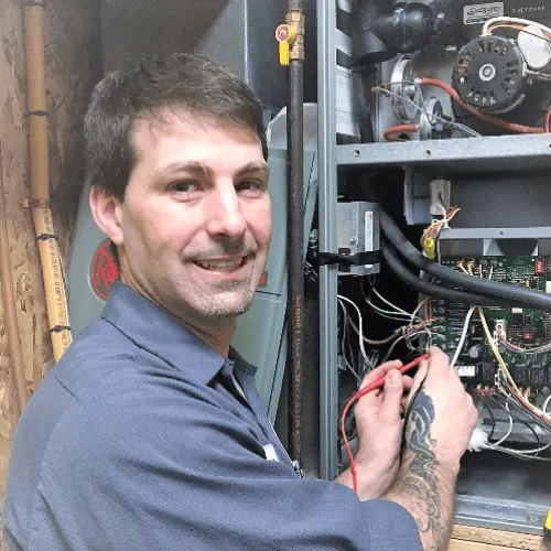 Man repairing industrial equipment